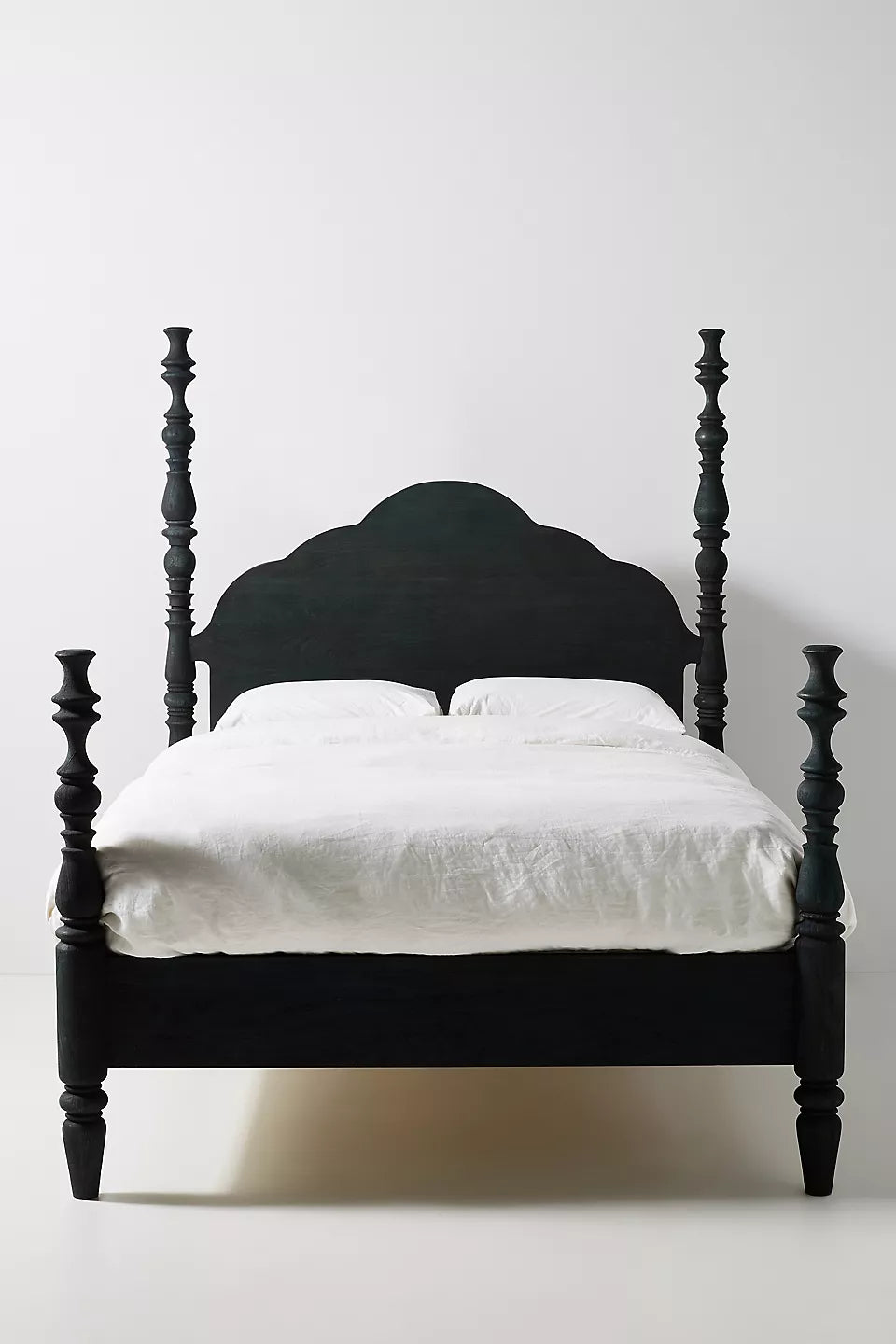 This is a Spindle Four-Poster Bed, featuring intricately turned posts and a classic yet bold design.-hansa handicraft