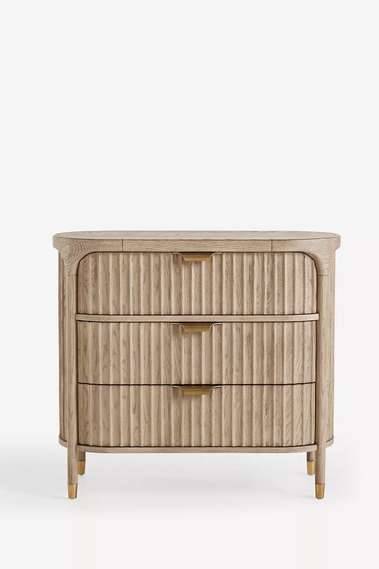 This is a stylish three-drawer dresser with a mid-century modern aesthetic.-HANSA HANDICRAFT
