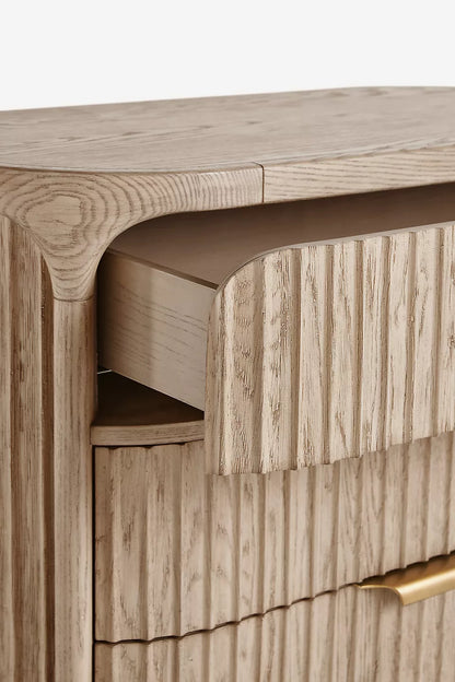 This is a stylish three-drawer dresser with a mid-century modern aesthetic.-HANSA HANDICRAFT