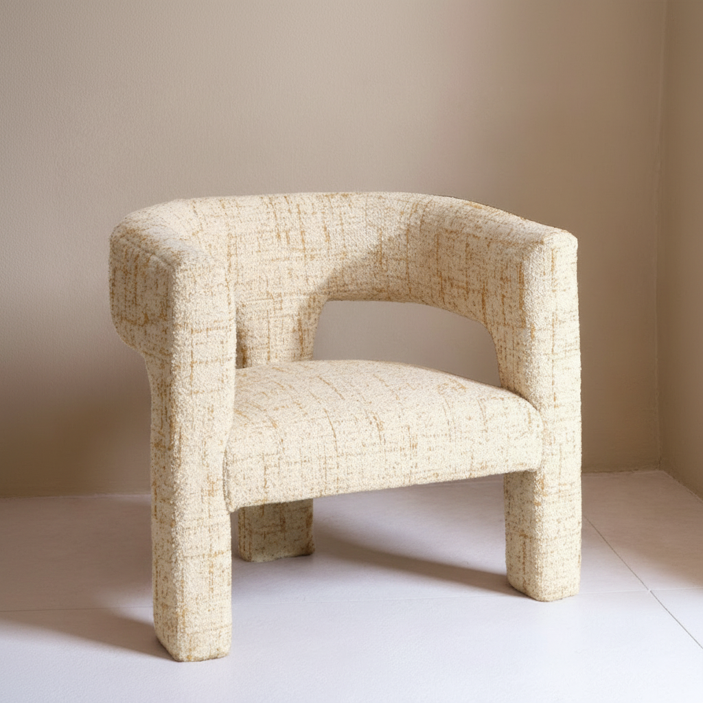 Beige textured armchair on a plain background
