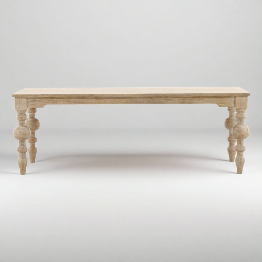 Wooden table with turned legs on a white background