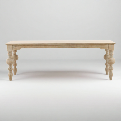 Wooden table with turned legs on a white background