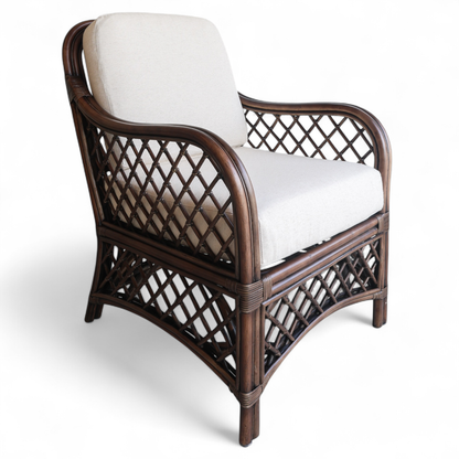 Angled image of rattan chair showing side trellis detail