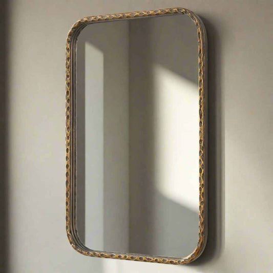 A LITTLE KNOTTY BRONZE VANITY MIRROR