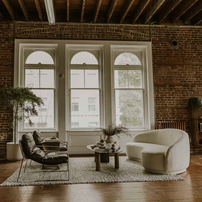 NICKO RAW ALUMINUM OVAL COFFEE TABLE