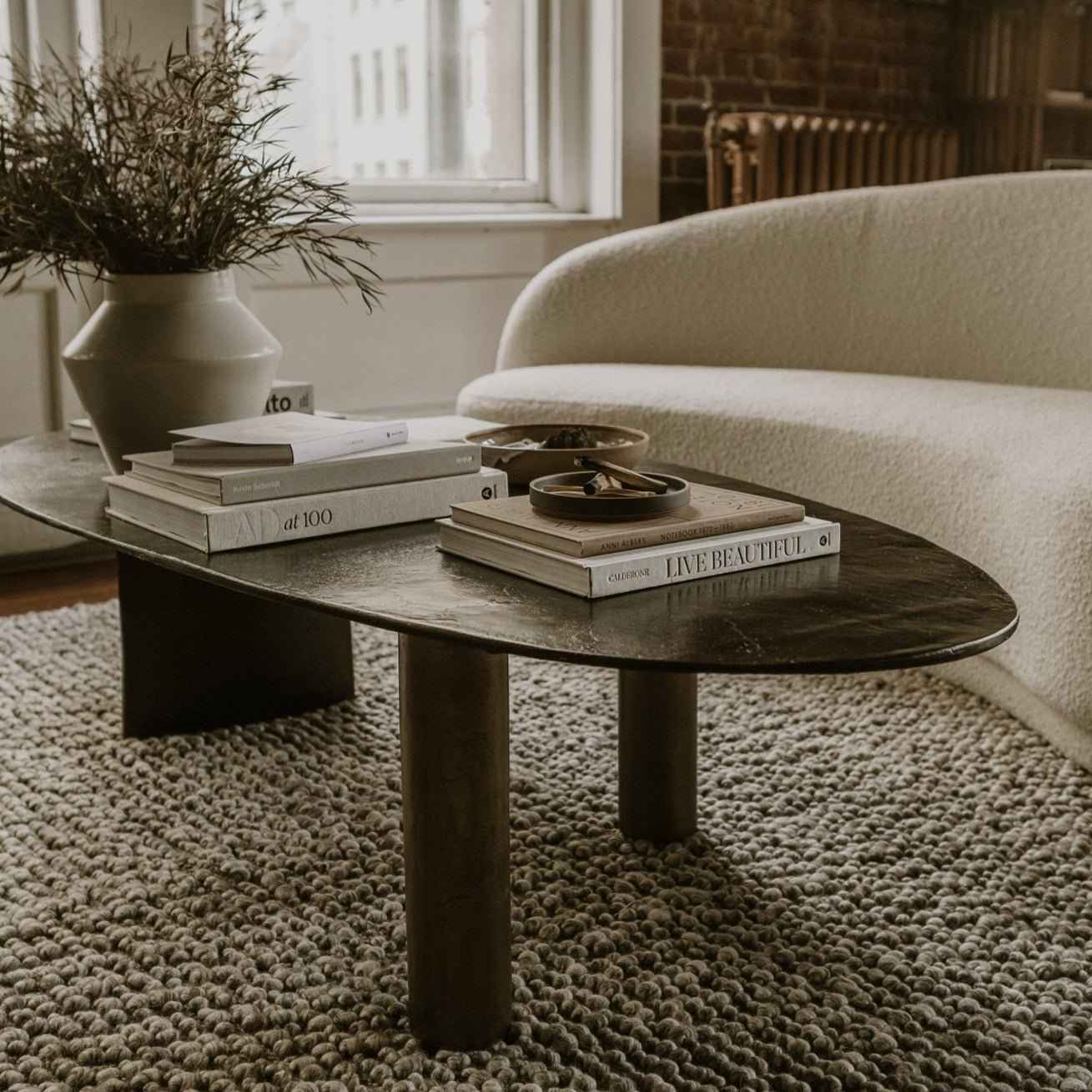 NICKO RAW ALUMINUM OVAL COFFEE TABLE