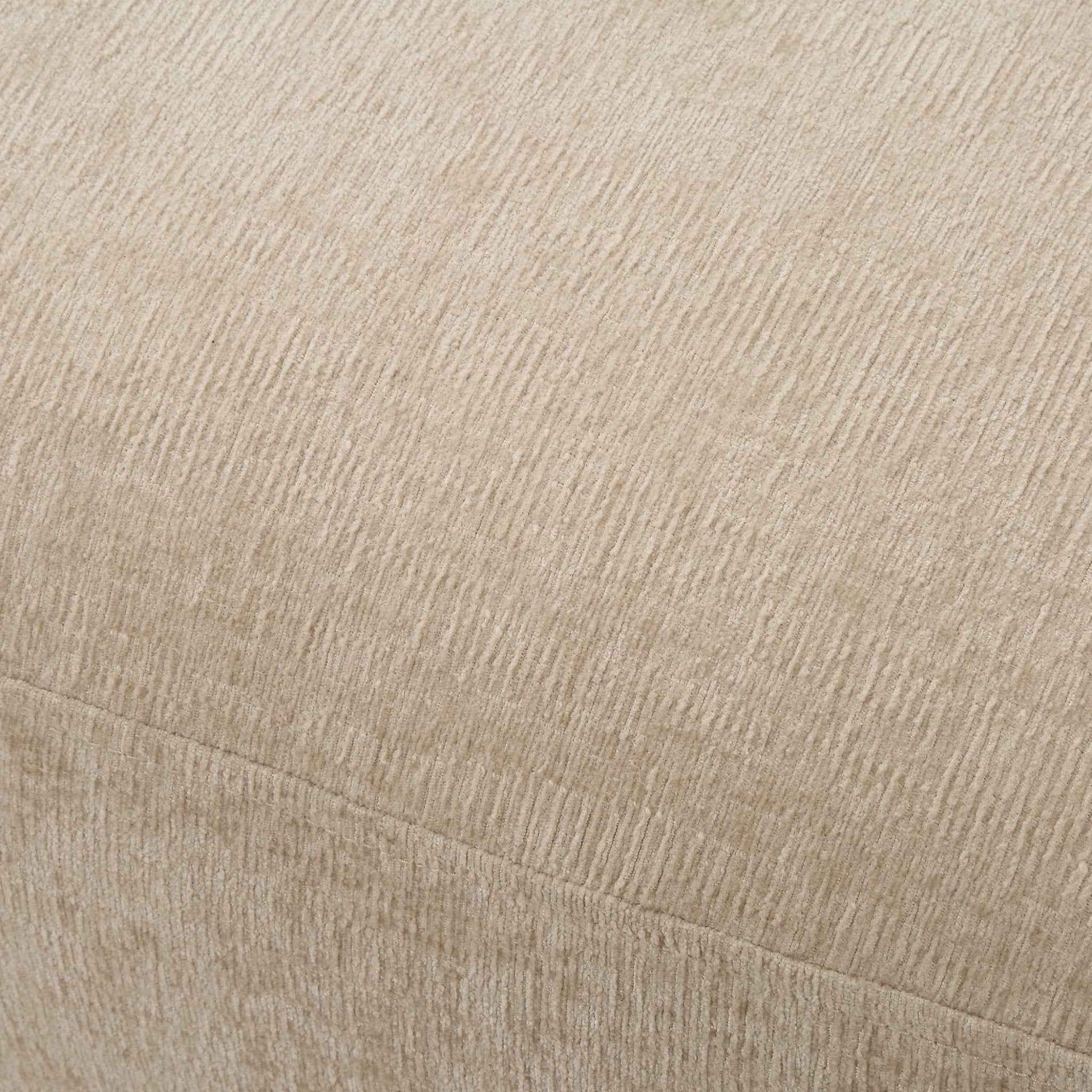 SCULPTED SWIVEL CHAIR: SAND