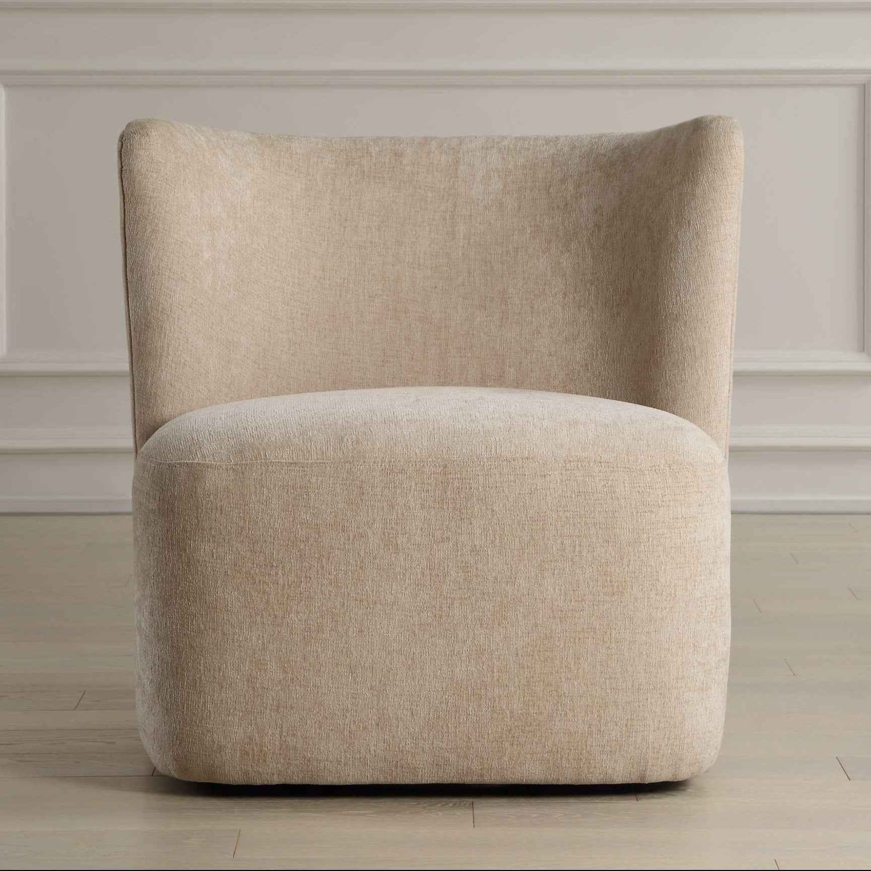 SCULPTED SWIVEL CHAIR: SAND
